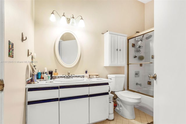 10630 NW 14th St Unit 115, Plantation, FL 33322 - full bath featuring vanity, tile patterned floors, toilet, and bath / shower combo with glass door