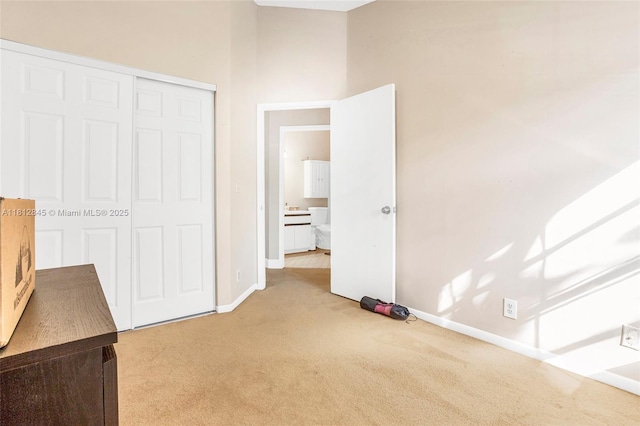 10630 NW 14th St Unit 115, Plantation, FL 33322 - unfurnished bedroom with carpet, baseboards, and a closet