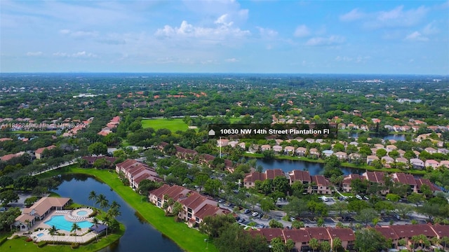10630 NW 14th St Unit 115, Plantation, FL 33322 - aerial perspective of suburban area with a nearby body of water and a pool area
