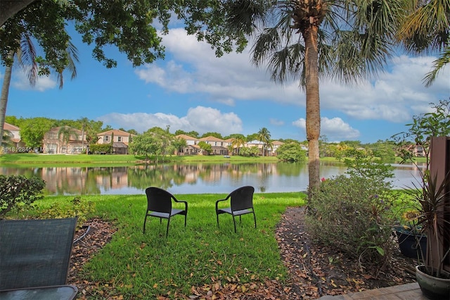10630 NW 14th St Unit 115, Plantation, FL 33322 - view of green lawn with a water view and a residential view