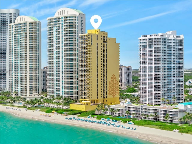 16275 Collins Ave Unit 2101, Sunny Isles Beach, FL 33160 - view of building exterior with view of water and beach and a view of skyline