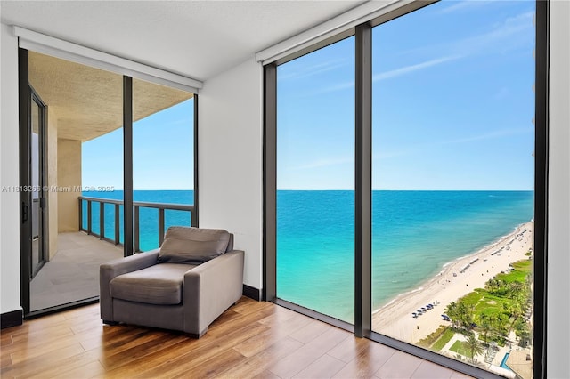 16275 Collins Ave Unit 2101, Sunny Isles Beach, FL 33160 - sunroom / solarium with view of water and beach