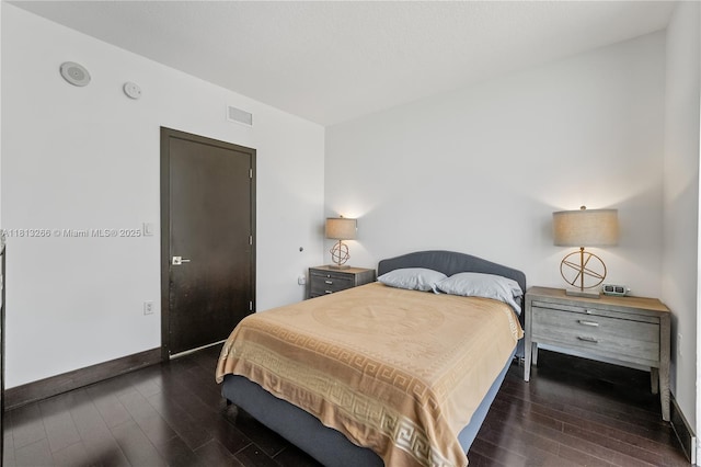 16275 Collins Ave Unit 2101, Sunny Isles Beach, FL 33160 - bedroom with hardwood / wood-style flooring and baseboards
