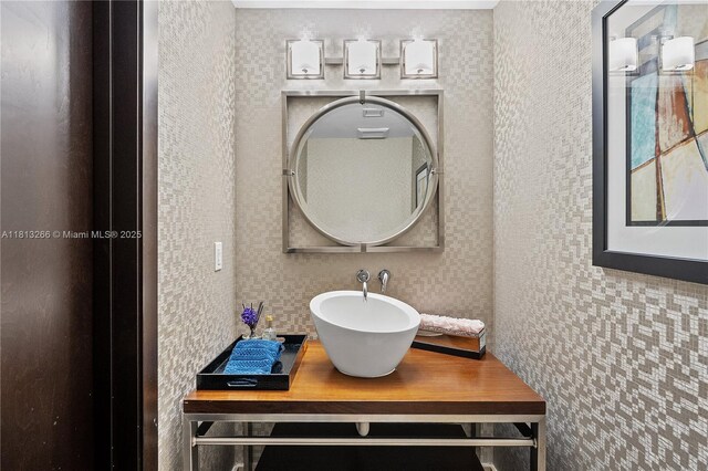 16275 Collins Ave Unit 2101, Sunny Isles Beach, FL 33160 - bathroom with a sink and wallpapered walls