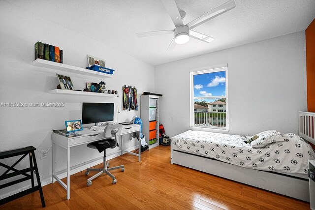 4007 Turquoise Trl, Weston, FL 33331 - bedroom featuring wood finished floors, an office area, and ceiling fan