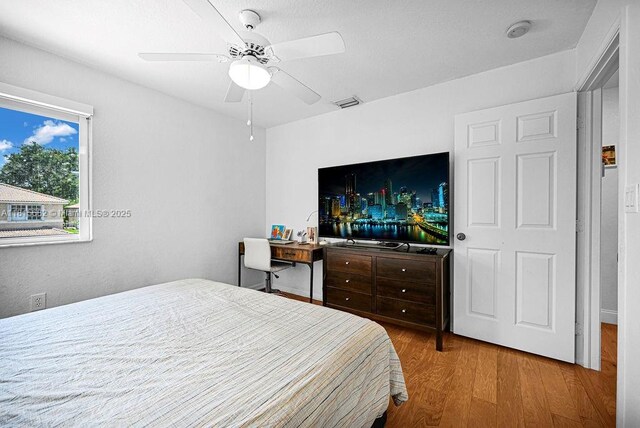 4007 Turquoise Trl, Weston, FL 33331 - bedroom featuring wood finished floors and ceiling fan