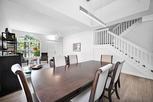 4007 Turquoise Trl, Weston, FL 33331 - dining room featuring stairs and wood finished floors