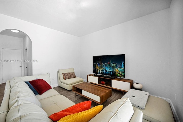 4007 Turquoise Trl, Weston, FL 33331 - living area featuring wood finished floors, arched walkways, and baseboards