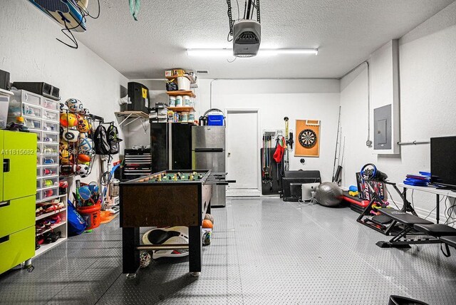4007 Turquoise Trl, Weston, FL 33331 - garage with a garage door opener and electric panel