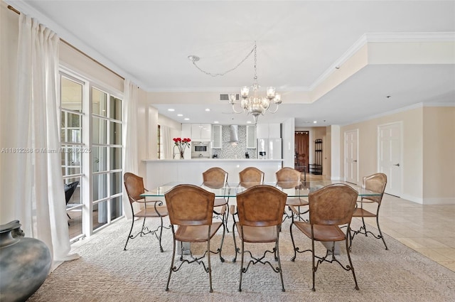 2124 Fisher Island Dr Unit 2124, Miami Beach, FL 33109 - dining room with a chandelier, crown molding, a tray ceiling, light tile patterned floors, and recessed lighting