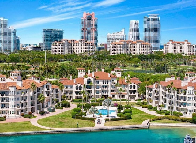 2124 Fisher Island Dr Unit 2124, Miami Beach, FL 33109 - bird's eye view of a pool area and city skyline
