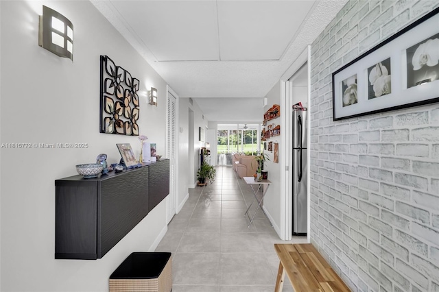 3301 S Palm Aire Dr Unit 106, Pompano Beach, FL 33069 - corridor with light tile patterned floors