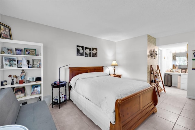 3301 S Palm Aire Dr Unit 106, Pompano Beach, FL 33069 - bedroom with light tile patterned floors, radiator, and ensuite bath