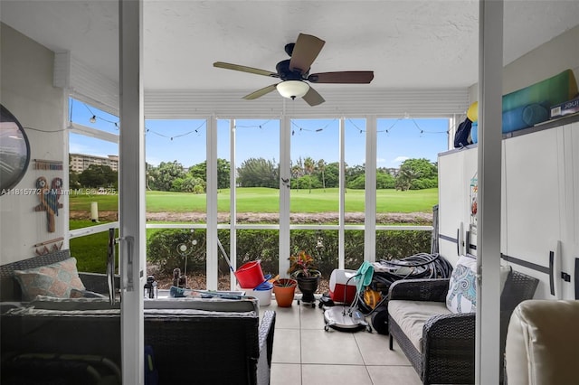 3301 S Palm Aire Dr Unit 106, Pompano Beach, FL 33069 - sunroom featuring view of golf course, ceiling fan, and plenty of natural light