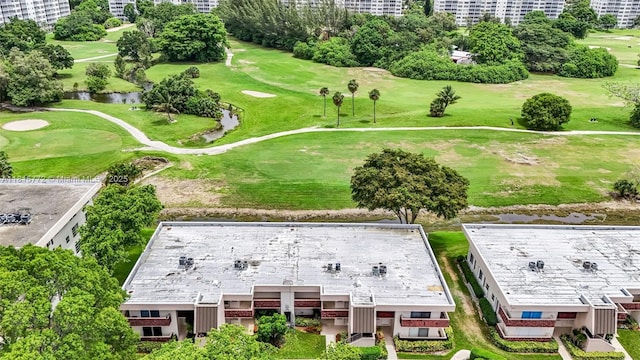 3301 S Palm Aire Dr Unit 106, Pompano Beach, FL 33069 - drone / aerial view of a golf course, apartment complex, and a large body of water