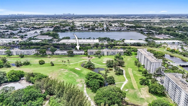 3301 S Palm Aire Dr Unit 106, Pompano Beach, FL 33069 - bird's eye view of apartment complex / building, a golf club, and a large body of water