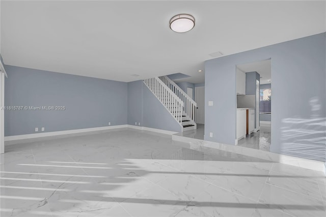 8211 NW 8th St Unit 2, Plantation, FL 33324 - unfurnished living room with light marble finish floors, stairs, and baseboards