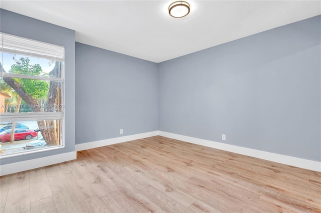 8211 NW 8th St Unit 2, Plantation, FL 33324 - empty room with wood finished floors and baseboards