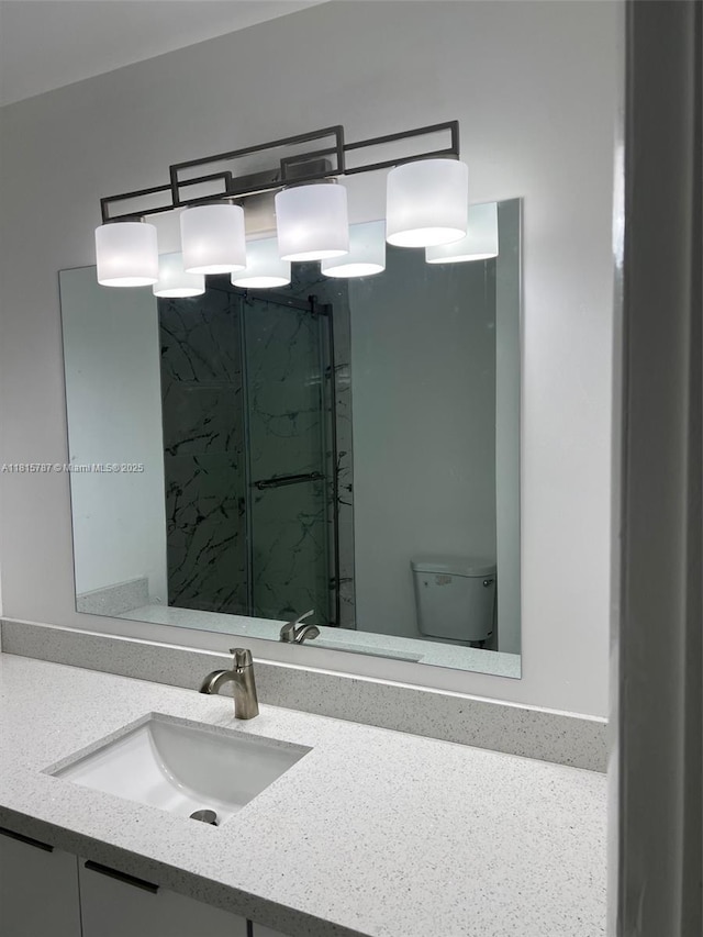 8211 NW 8th St Unit 2, Plantation, FL 33324 - bathroom featuring toilet, vanity, and a shower stall