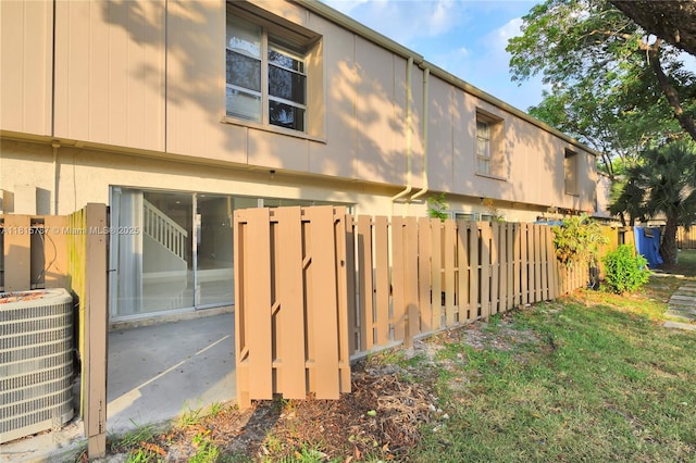 8211 NW 8th St Unit 2, Plantation, FL 33324 - view of side of property with central AC unit