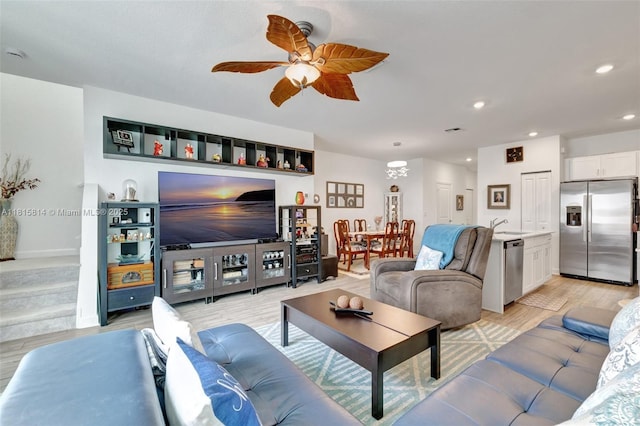 680 SE Lake Falls St, Port St Lucie, FL 34984 - living area with light wood finished floors, a ceiling fan, recessed lighting, and baseboards