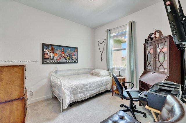 680 SE Lake Falls St, Port St Lucie, FL 34984 - carpeted bedroom featuring baseboards and an office area
