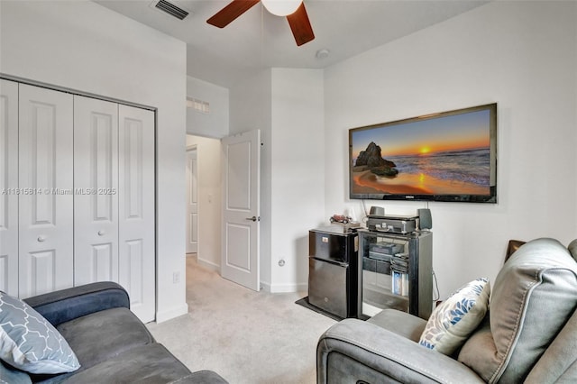 680 SE Lake Falls St, Port St Lucie, FL 34984 - living room featuring carpet flooring, a ceiling fan, and baseboards