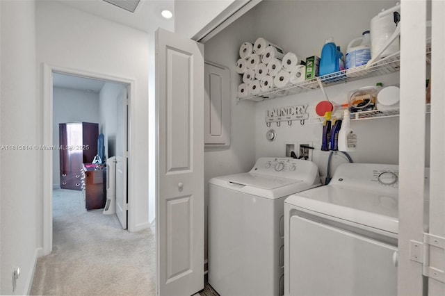 680 SE Lake Falls St, Port St Lucie, FL 34984 - washroom with washer and dryer, light carpet, and baseboards