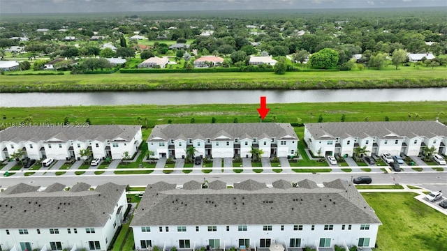 680 SE Lake Falls St, Port St Lucie, FL 34984 - aerial view of residential area with a large body of water