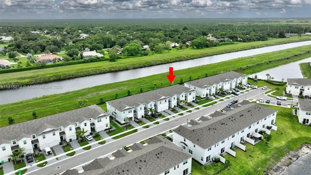 680 SE Lake Falls St, Port St Lucie, FL 34984 - aerial perspective of suburban area with a nearby body of water