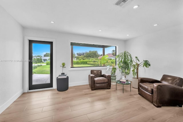 13711 SW 29th St, Davie, FL 33330 - sitting room featuring light wood-style flooring, baseboards, and recessed lighting