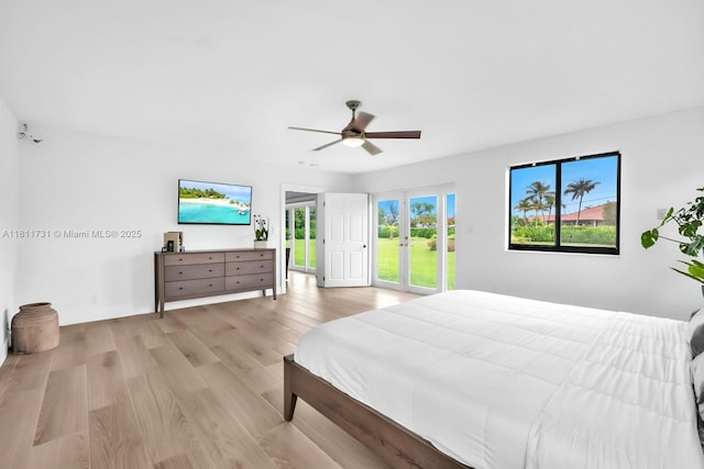13711 SW 29th St, Davie, FL 33330 - bedroom with access to outside, light wood finished floors, and a ceiling fan