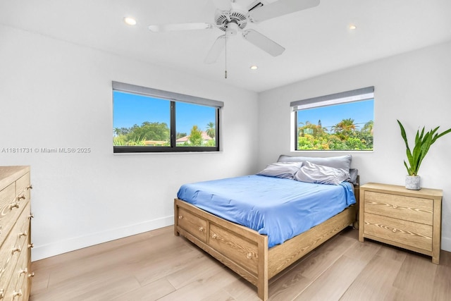 13711 SW 29th St, Davie, FL 33330 - bedroom featuring multiple windows, baseboards, light wood-style flooring, and recessed lighting