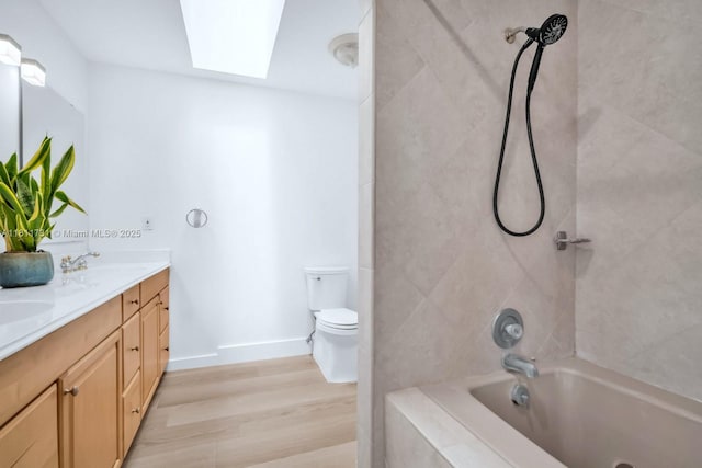 13711 SW 29th St, Davie, FL 33330 - full bath featuring a skylight, double vanity, shower / washtub combination, toilet, and wood finished floors