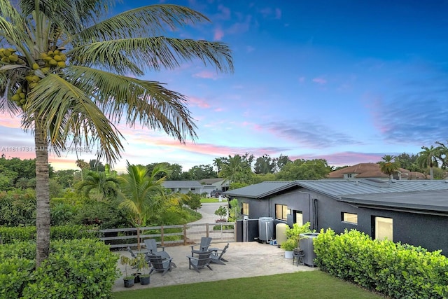 13711 SW 29th St, Davie, FL 33330 - view of yard featuring a patio and central air condition unit