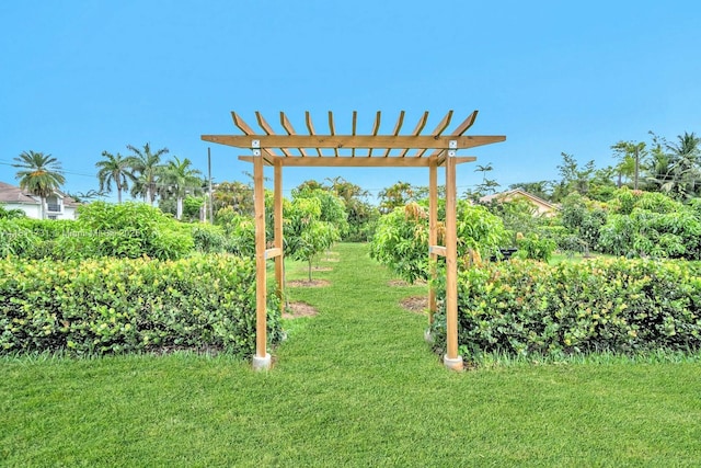 13711 SW 29th St, Davie, FL 33330 - view of green lawn with a pergola