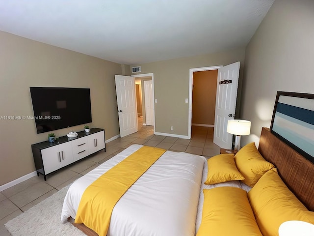 9001 SW 77th Ave Unit C705, Miami, FL 33156 - bedroom with tile patterned floors and baseboards