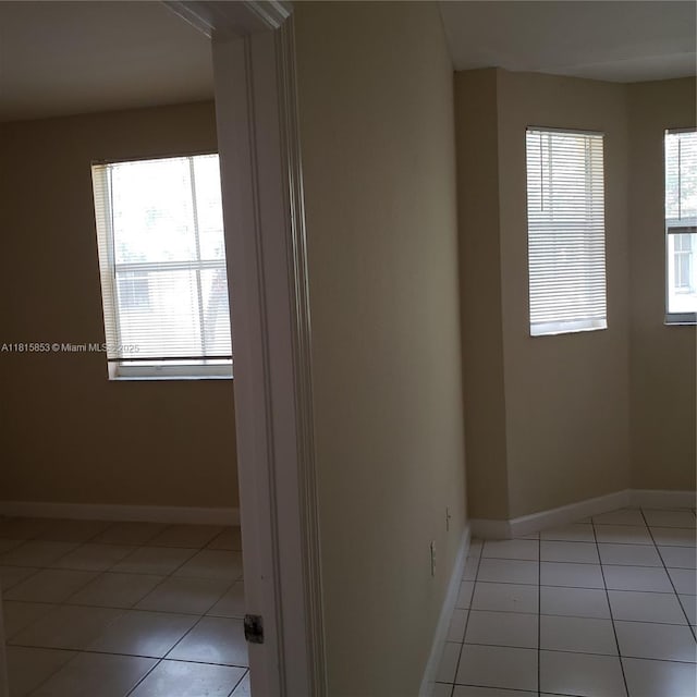 1666 SE 27th Ct Unit 205, Homestead, FL 33035 - empty room featuring light tile patterned flooring and baseboards