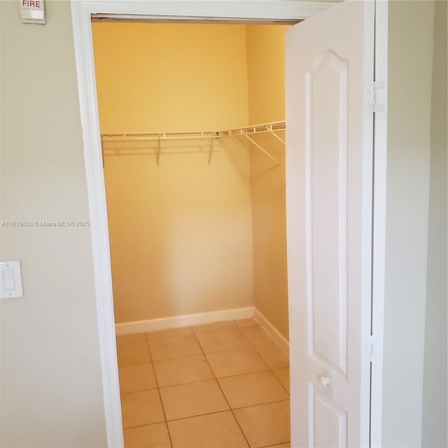1666 SE 27th Ct Unit 205, Homestead, FL 33035 - spacious closet featuring light tile patterned flooring