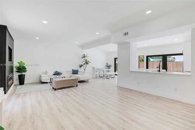 3105 SW 16th St, Fort Lauderdale, FL 33312 - living area with wood finished floors, recessed lighting, and baseboards