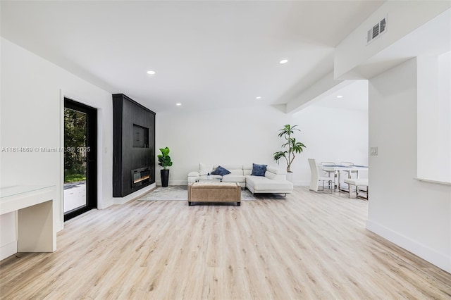 3105 SW 16th St, Fort Lauderdale, FL 33312 - living area with light wood-style floors, recessed lighting, baseboards, and a fireplace