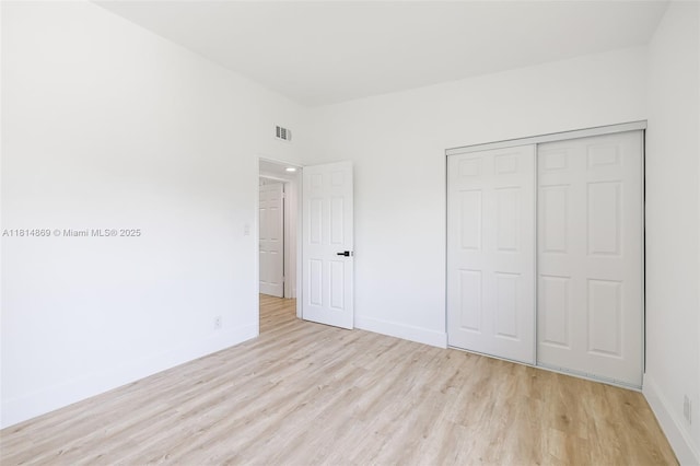 3105 SW 16th St, Fort Lauderdale, FL 33312 - unfurnished bedroom featuring wood finished floors, baseboards, and a closet