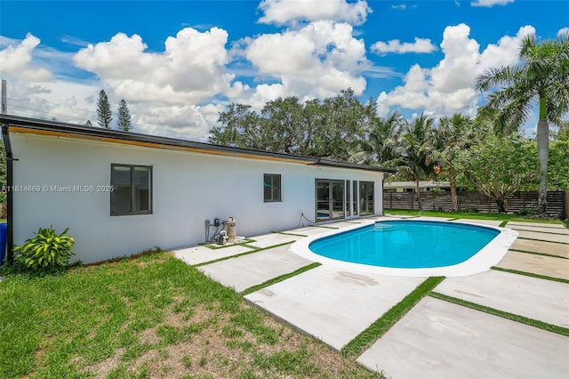 3105 SW 16th St, Fort Lauderdale, FL 33312 - rear view of property featuring stucco siding and a patio area