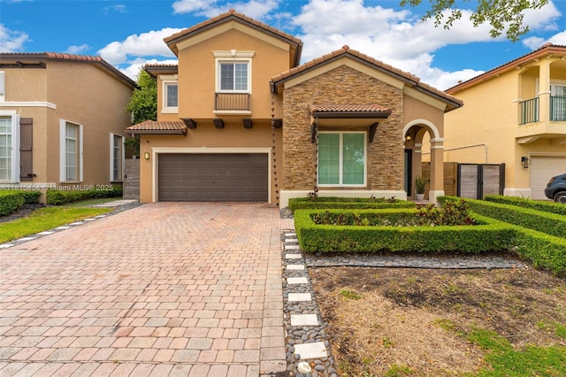 22618 SW 94th Path, Cutler Bay, FL 33190 - view of front facade featuring stone siding, a tile roof, decorative driveway, and stucco siding