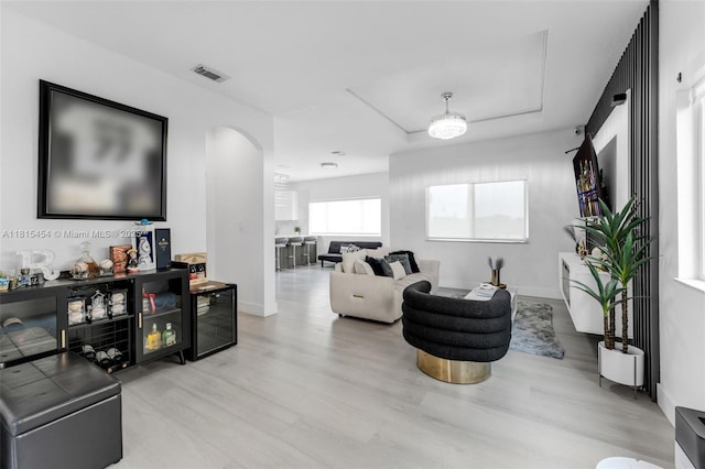 22618 SW 94th Path, Cutler Bay, FL 33190 - living room with arched walkways, light wood-type flooring, and baseboards