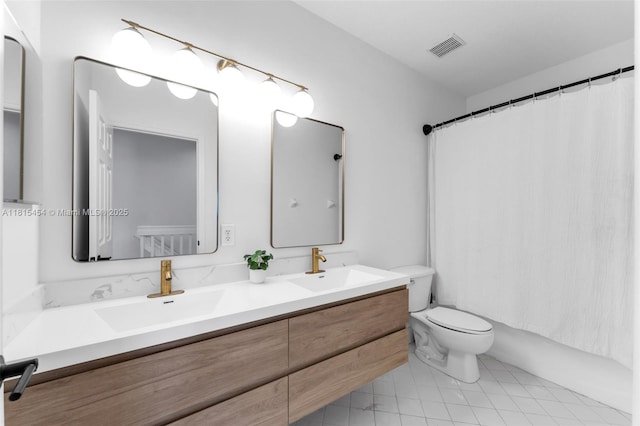 22618 SW 94th Path, Cutler Bay, FL 33190 - full bathroom featuring double vanity and toilet
