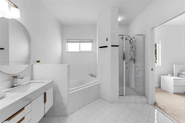 22618 SW 94th Path, Cutler Bay, FL 33190 - bathroom with vanity, a bath, a shower stall, and tile patterned flooring