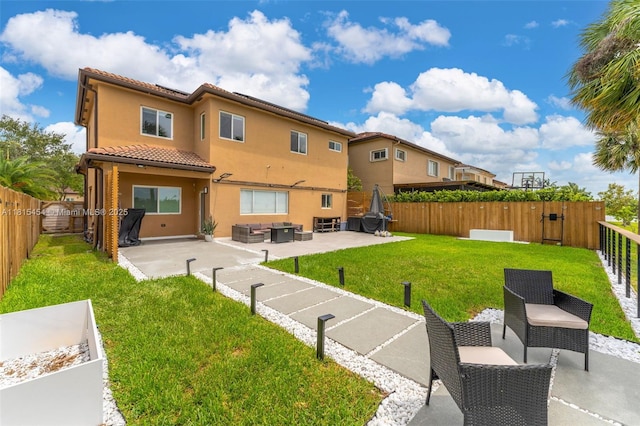 22618 SW 94th Path, Cutler Bay, FL 33190 - back of house featuring a tiled roof, stucco siding, and a patio