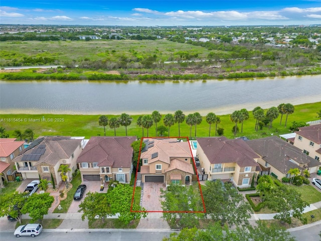 22618 SW 94th Path, Cutler Bay, FL 33190 - aerial perspective of suburban area featuring a nearby body of water and property parcel outlined