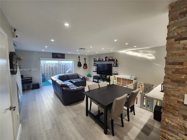 10875 NW 8th St, Pembroke Pines, FL 33026 - dining area featuring light wood-type flooring and recessed lighting